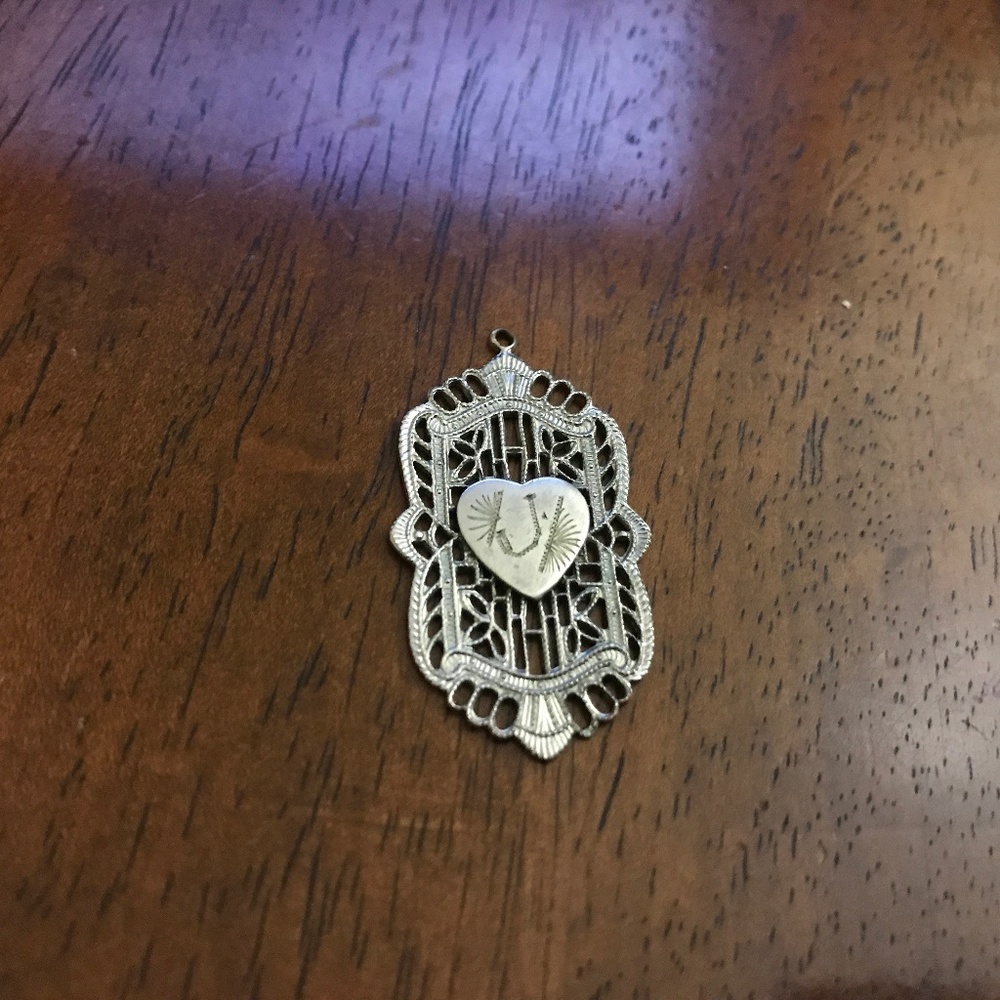 Antique filigree pendant with heart